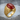 Oval Masonic Carnelian Ring, gold vermeil, side angle view on stone surface