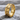 Cuneiform Tablet Ring, gold vermeil, product photo on stone surface