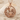 Aquarius Water Carrier Pendant, rose gold, front view on shell