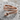 Serpentine wrap ring, rose gold, product photo on stone surface
