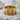 Skull and Stars Ring, gold vermeil, product photo resting on stone surface