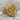 Alpha Omega Chi Rho Ring, gold vermeil, product photo resting on stone