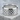 Dragon Scale Pattern Ring, polished, product photo on stone pedestal
