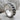 Chain spinner ring, oxidized silver, product photo on stone