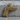 Engraved Pistol Gun Pendant, gold vermeil, front view on stone