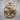 Lion Pride Pendant, gold vermeil, front view on wood base