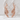 Dragon Ear Climber Earring, rose gold, pair shown on stone pedestal
