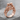 Valdaro Embrace Ring, rose gold, product photo on stone surface