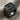 Floral Initial Signet Ring, black rhodium, angled product view on fabric