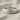 Celtic Braided Knot Ring, polished silver, front view on linen