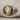 Greek Goddess Ring, two-tone, angled view with gold portrait and silver band
