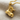 Work Boot Pendant, gold vermeil, product photo on woven linen fabric