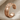 Urartu Griffin Ear Cuff Earring, rose gold, side view on fabric
