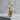 Abstract Face Earring, gold vermeil, angled view on stone base