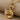 Floating Swan Pendant, gold vermeil, angled view on stone