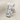 Göbeklitepe pillar lapel pin in polished silver, front view on fabric