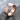 Double Venus Ring, rose gold, angled product view on stone surface