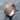Love Is Love Ring in black rhodium plated finish, angled on stone