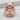 Atlas Rise Ring, rose gold, front view on stone surface