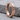 Rhombus Faceted Hoop Earring, rose gold vermeil, angled product photo on stone surface