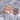 Bear Paw Shield Lapel Pin, rose gold, product photo on stone surface