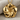 Plumeria Flower Pendant in gold vermeil, product photo on fabric