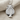 Tropical Palm Pendant, polished silver, front product view on linen fabric