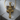 Gothic Crown Cross Pendant, gold vermeil, product photo on wood block
