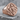 Winged Dragon Signet Ring, rose gold, angled front view on stone