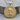 Jesus Christ Medallion Pendant, gold vermeil, front view on wood
