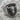 Bull Signet Ring, oxidized, angled view on rock surface