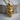 Star Crowned Skull Pendant, gold vermeil, product photo on wood block
