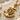 Ship Wheel Anchor Pendant, gold vermeil, product photo on sand