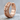Chevron Hoop Earring, rose gold, product photo on stone