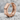 Faceted Octagon Hoop Earring, rose gold, product photo on stone surface