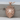 Crowned Lion Shield Pendant, rose gold, front view on wood display