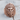 Indian Chief War Bonnet Ring, rose gold plated, front view on wood