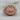 Winged Scarab Eye of Horus Ring, rose gold, front view on wood