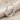 Contour Wire Arch Ring, polished, product photo on fabric