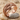Garnet Lovers Knot Wedding Ring, rose gold, studio view
