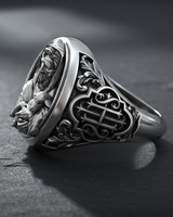 Side profile of the 925 sterling silver Christian Shepherd Ring, showcasing the intricate scrollwork and monogram on the shank.