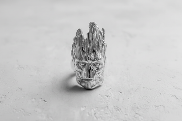Front view of handcrafted 925 sterling silver Groot ring showing detailed bark texture and expressive face