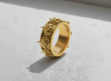 Gold vermeil skull pumpkin ring with intricate Jack-o'-lantern faces and beaded borders on white background