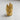 Front view of 14K gold vermeil Groot ring with intricate bark texture and expressive face detail
