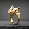 Gold vermeil silver rhinoceros ring featuring realistic skin texture and horn detail on dark stone background