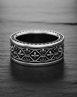 Oxidized 925 sterling Silver Fleur-de-lis Ring with a detailed medieval design, shown in black and white.