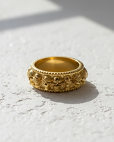 14K gold vermeil wise skulls ring featuring see hear speak no evil design with beaded edges on white surface