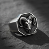 Front view of 925 sterling silver ram signet ring featuring detailed horns and oxidized background on dark stone
