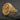 Gold vermeil Jesus Christ signet ring with detailed portrait and religious iconography on dark background