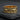 14K gold vermeil silver polar bear ring with intricate animal relief carving on dark slate background